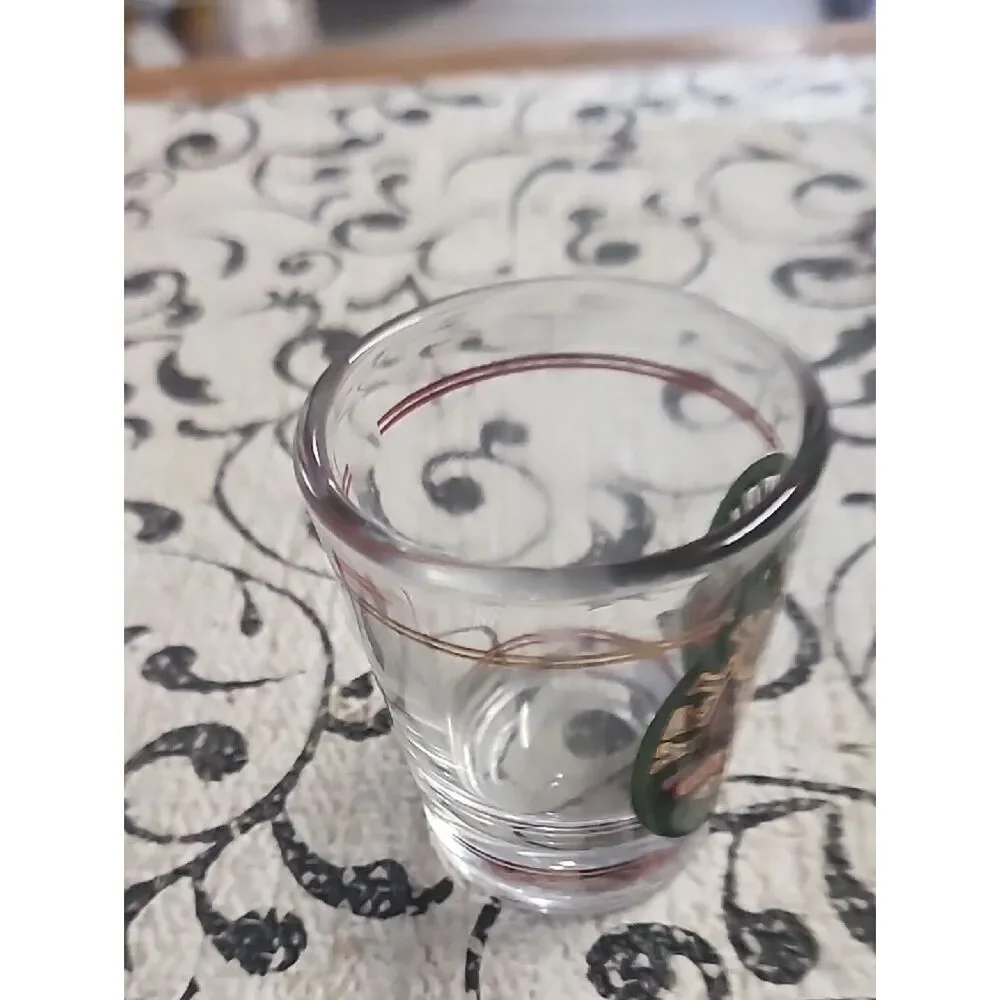 Yellowstone Shot Glass with Green and Gold Logo